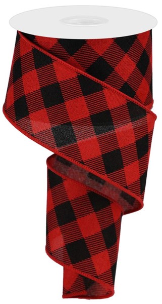 a roll of red and black plaid ribbon