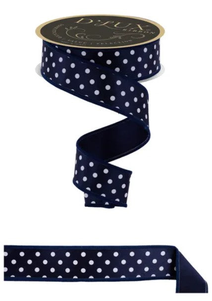 a navy blue and white polka dot ribbon with a gold label.
