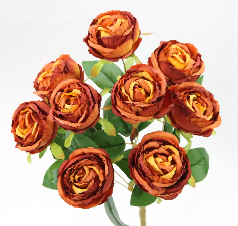 A bouquet of vibrant orange and yellow roses with green leaves.