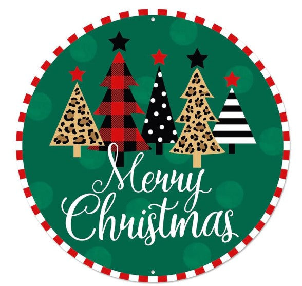 A festive Christmas-themed round sign with a green background and red and white stripes. The sign features a group of stylized Christmas trees with various patterns, including leopard print and plaid designs. The text "Merry Christmas" is displayed in a cursive font, creating a cheerful and holiday-inspired design.