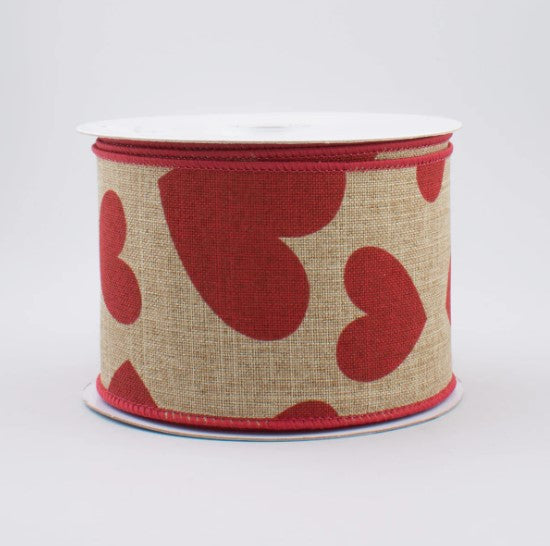 A burlap ribbon with a red heart pattern on it.