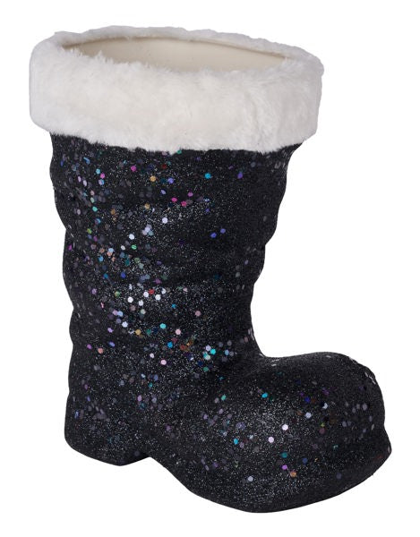 a pair of black boots with white fur