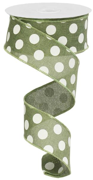 a green and white polka dot ribbon on a white background
