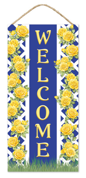 a welcome sign with yellow roses on it