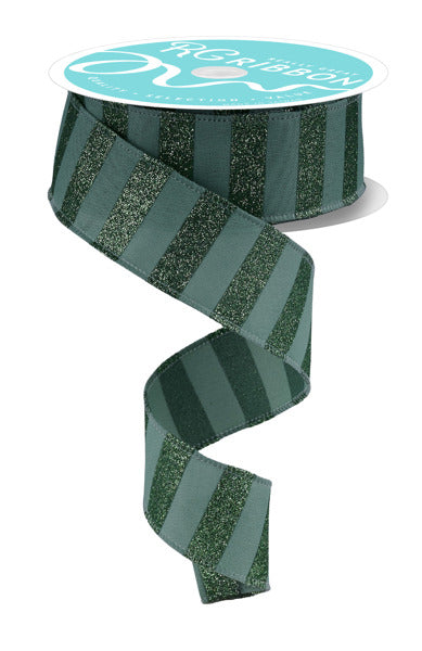 A roll of green and silver striped ribbon with a white label on top.