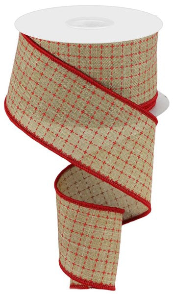 a roll of red and beige plaid ribbon