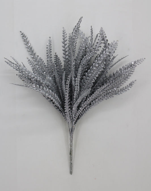 A silver-colored artificial plant or flower arrangement with numerous thin, leaf-like branches or leaves.