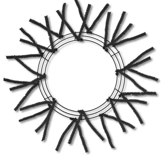 A circular frame made of black wire branches arranged in a radial pattern.