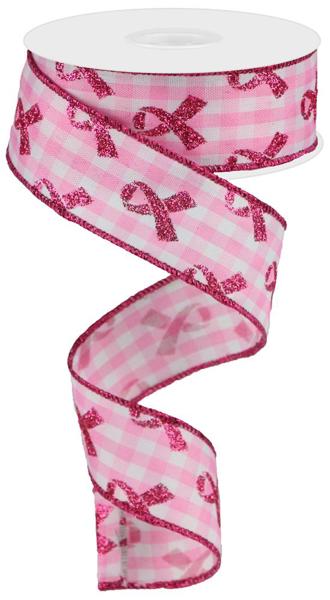 a pink ribbon with pink bows on it