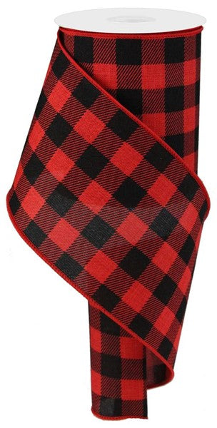 a red and black plaid ribbon on a white background