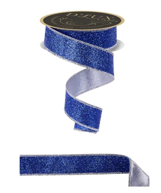A roll of blue glittery ribbon with a silver trim, and a silver ribbon below it.
