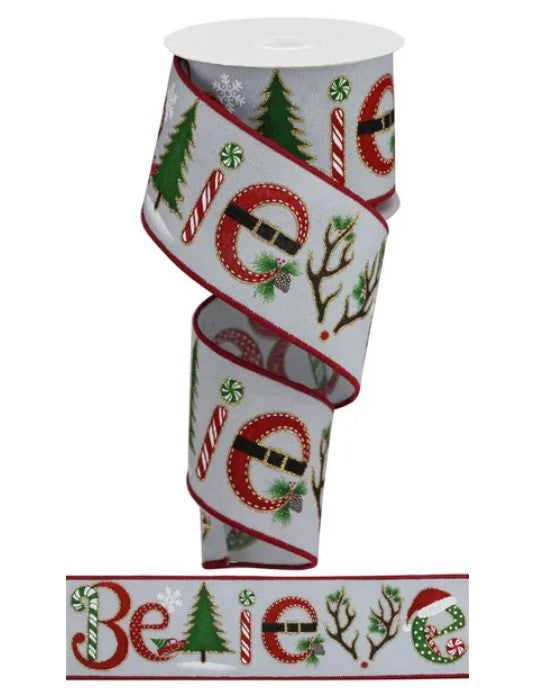 a Christmas-themed ribbon with various holiday-related designs, including trees, candy canes, and the word "Believe".