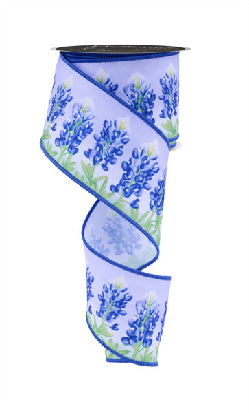 a blue and white vase with blue flowers on it