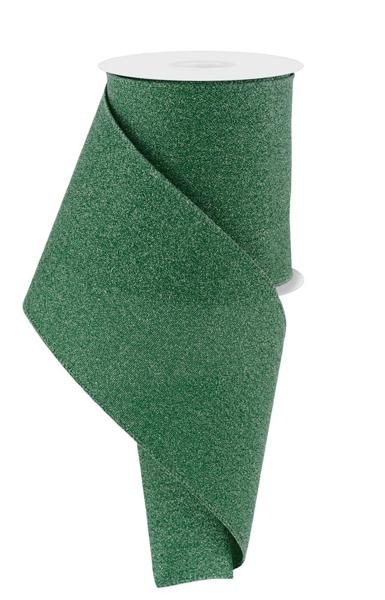 a roll of green cloth on a white background