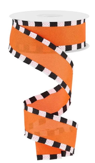 a spiral orange and black and white ribbon with a checkered border.