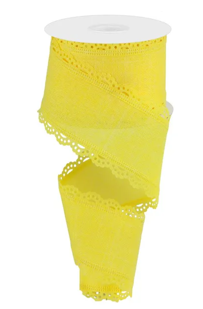 A roll of yellow fabric ribbon with a scalloped edge and a white backing.