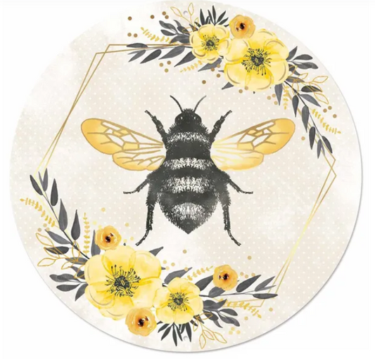 A round, floral-designed plate featuring a black and yellow bee surrounded by yellow flowers and leaves.
