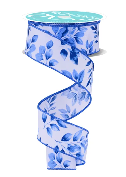 A blue and white floral patterned ribbon is shown, with the ribbon wrapped around a spool of the same ribbon.