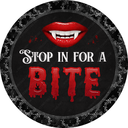 a sign that says stop in for a bite