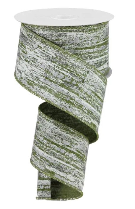 A roll of green and white striped ribbon with a white top.