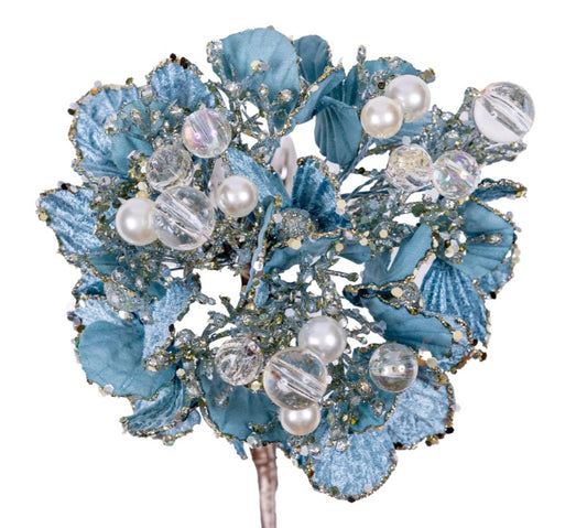 A decorative arrangement of blue leaves and clear beads, creating a visually appealing and intricate design.