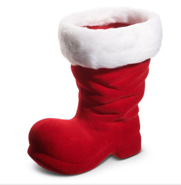 A red, plush Christmas stocking boot with a white fur trim around the top.