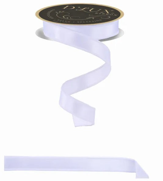 A roll of white ribbon with a black label on it.