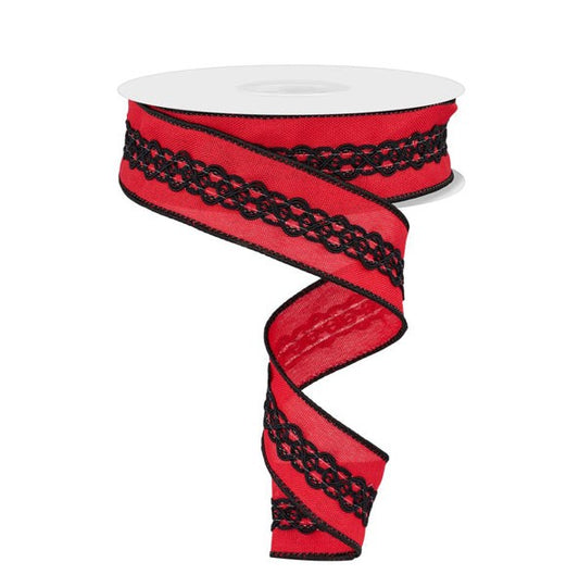 A red and black spiral-shaped ribbon with a black lace-like pattern on it.