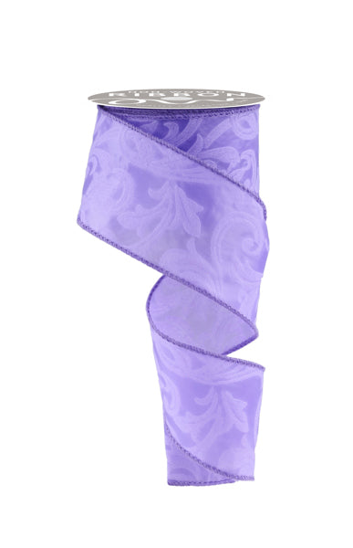 a roll of purple ribbon on a white background