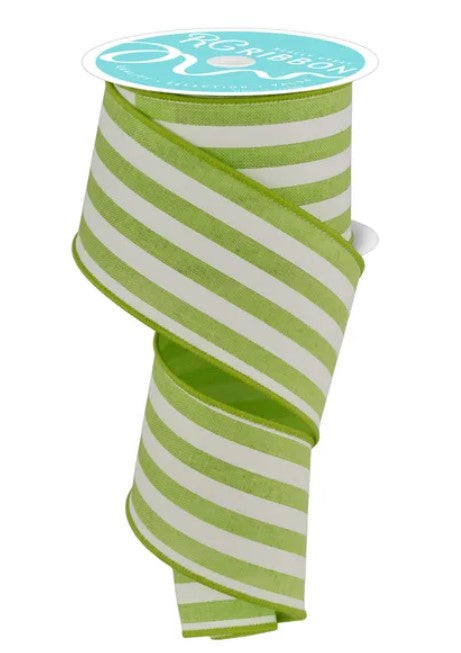 A roll of green and white striped ribbon with a label on top.