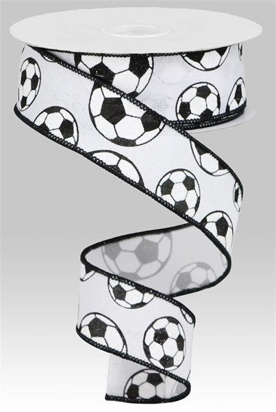 a white and black ribbon with soccer balls on it