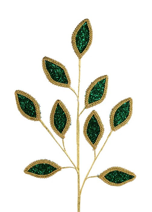 A gold-colored branch with green glitter leaf-shaped ornaments attached to it.