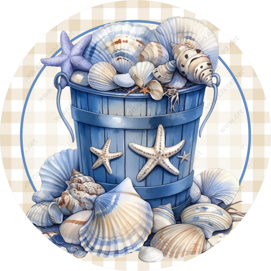 a bucket full of seashells and starfish on a checkered tablecloth