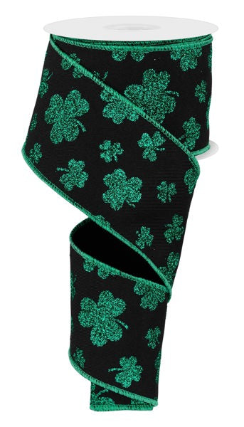 a black and green ribbon with shamrocks on it