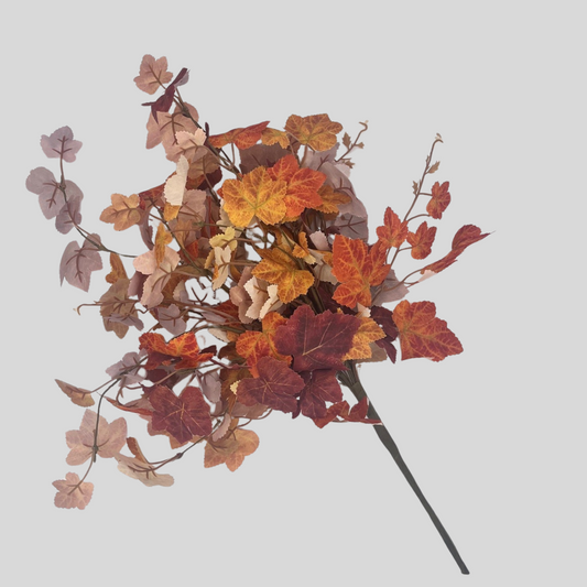 A bouquet of autumn leaves in various shades of orange, red, and brown, creating a vibrant and colorful arrangement.
