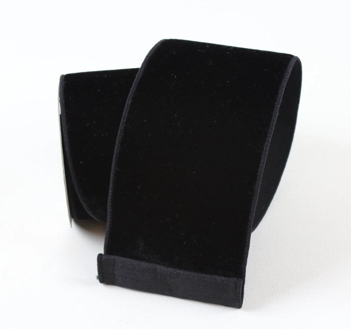 A black velvet ribbon is shown in the image.