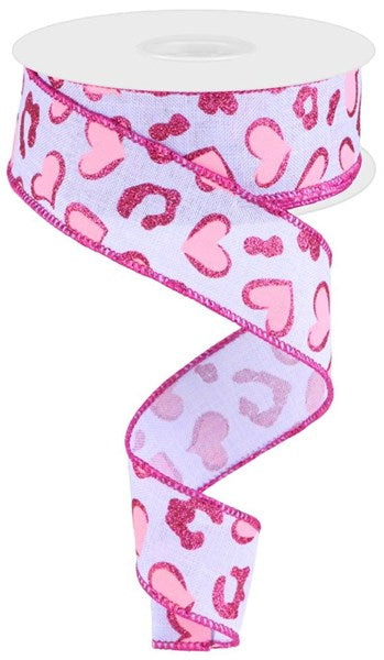 a pink and pink ribbon with hearts on it