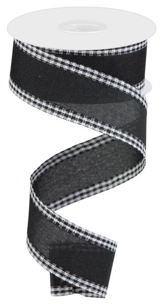 a roll of black and white plaid ribbon