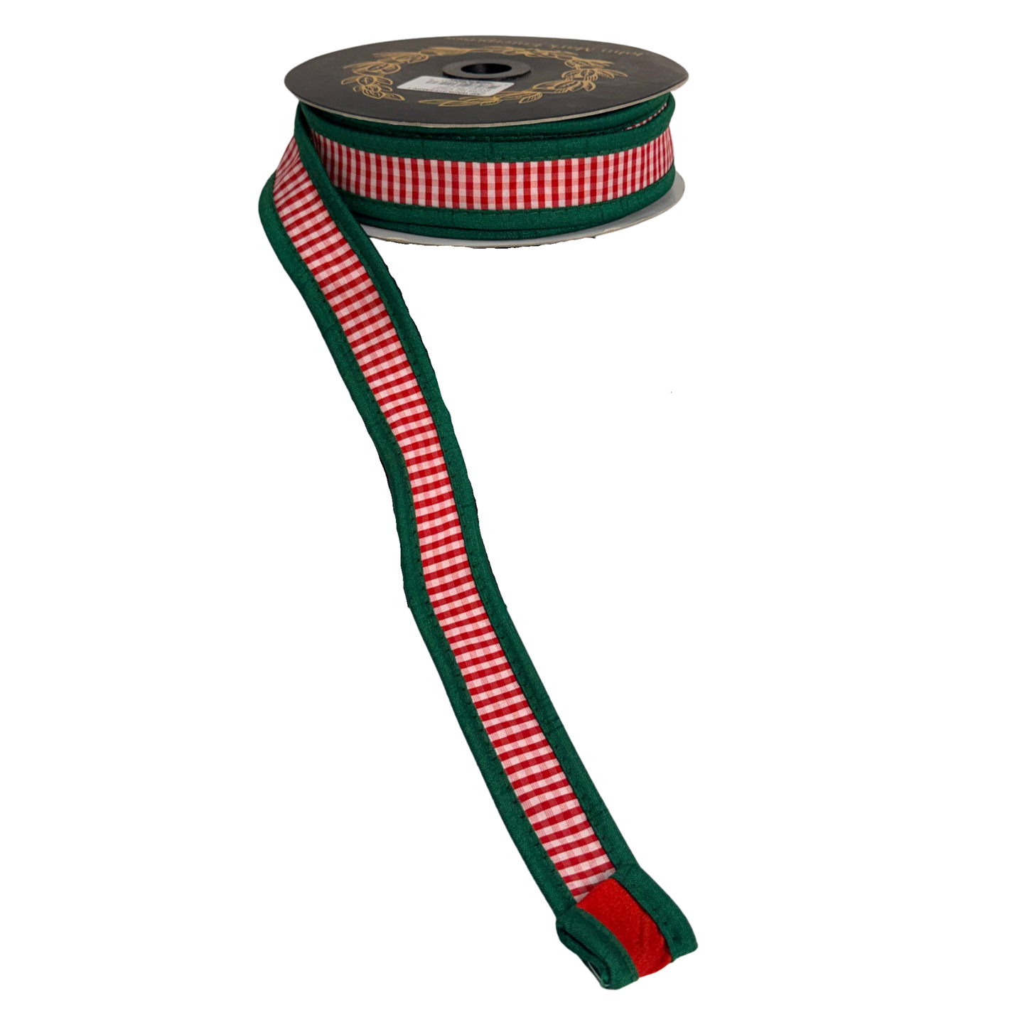 A spool of red and green gingham ribbon with a decorative pattern on the top.