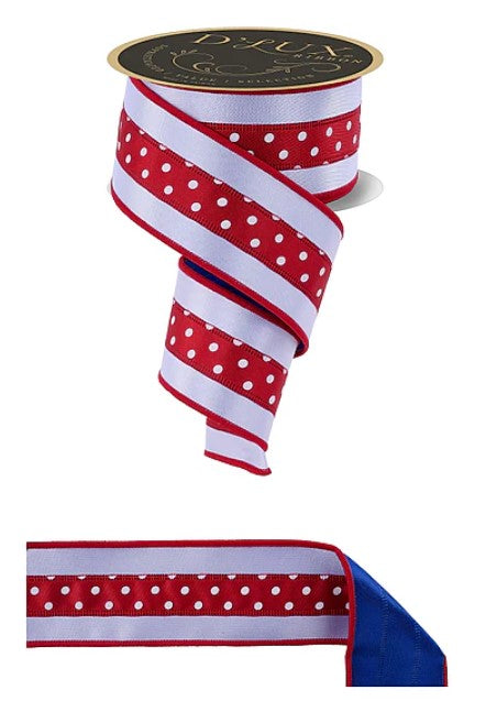 a red and white polka dot ribbon with a black and gold label.