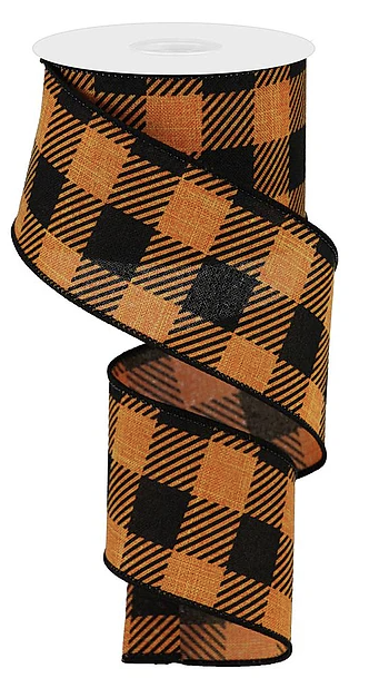 A roll of black and orange plaid ribbon.
