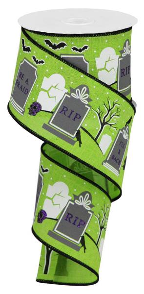 a green ribbon with tombstones and bats on it