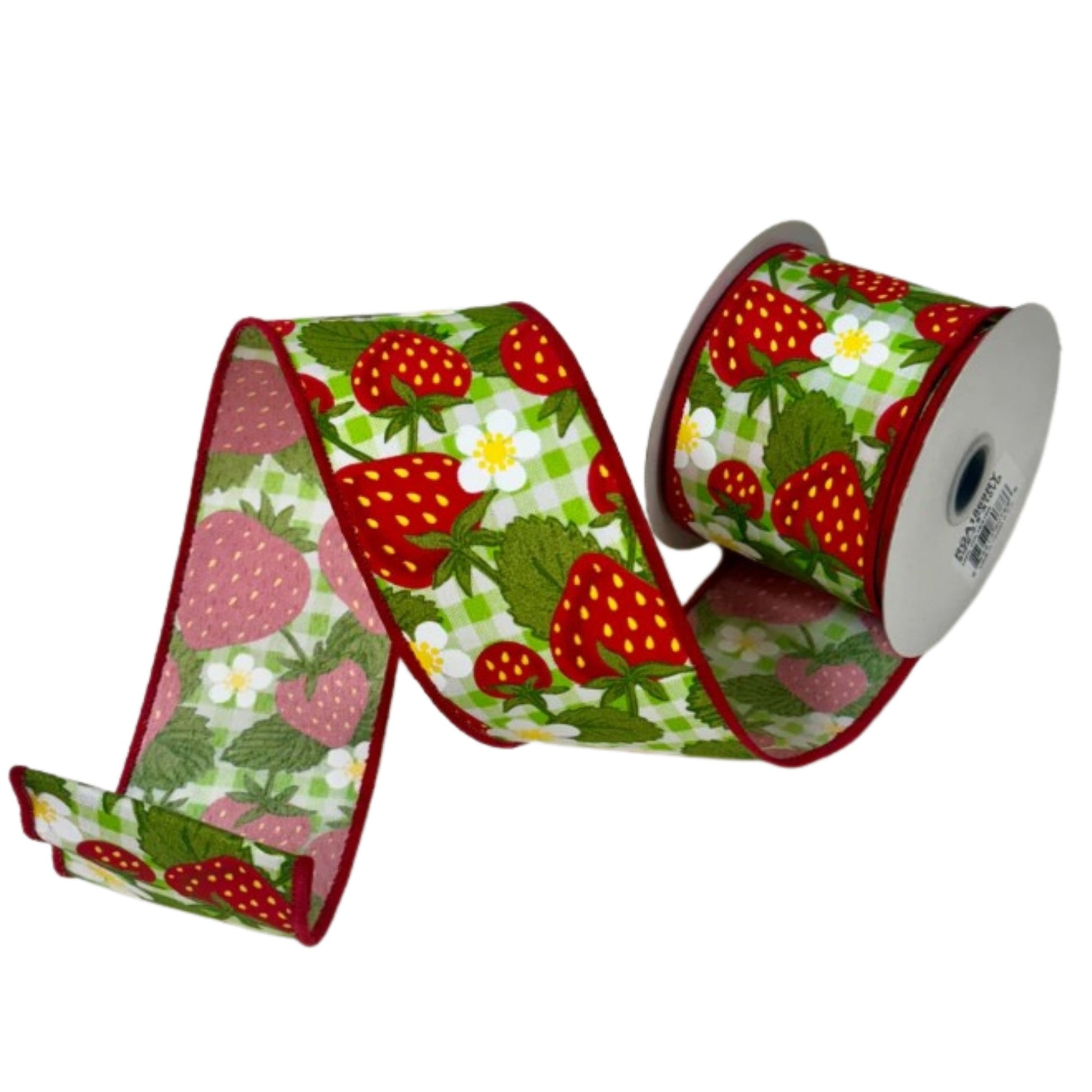 A roll of ribbon with a strawberry pattern printed on it.