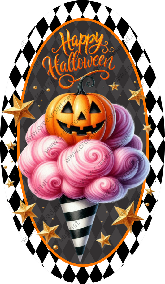 a picture of a cupcake with a jack - o'- lantern on top