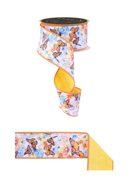 a ribbon with a floral pattern and butterflies printed on it.
