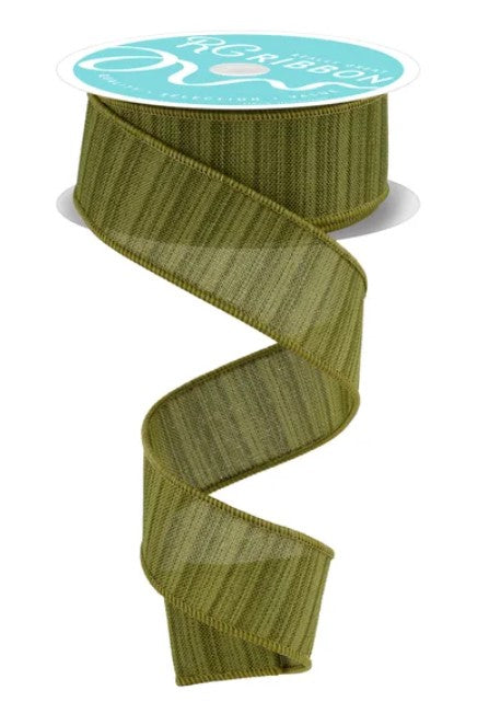 A roll of green ribbon with a label on top, indicating it is a decorative item.