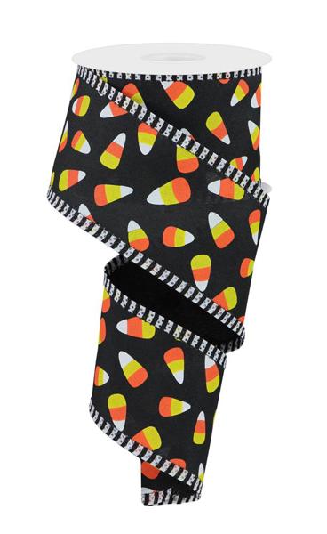 a roll of toilet paper with candy corn on it