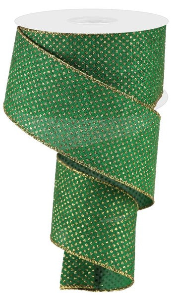 a green ribbon with gold dots on it