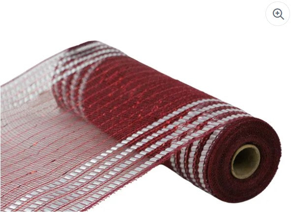 A roll of red and white mesh material.