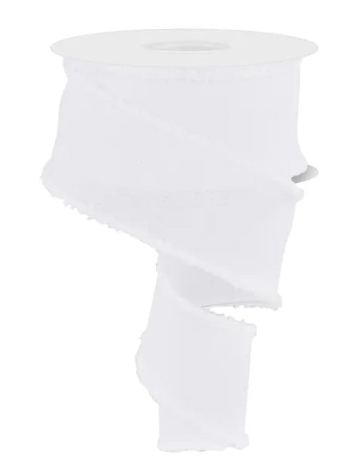 a roll of white ribbon against a white background.